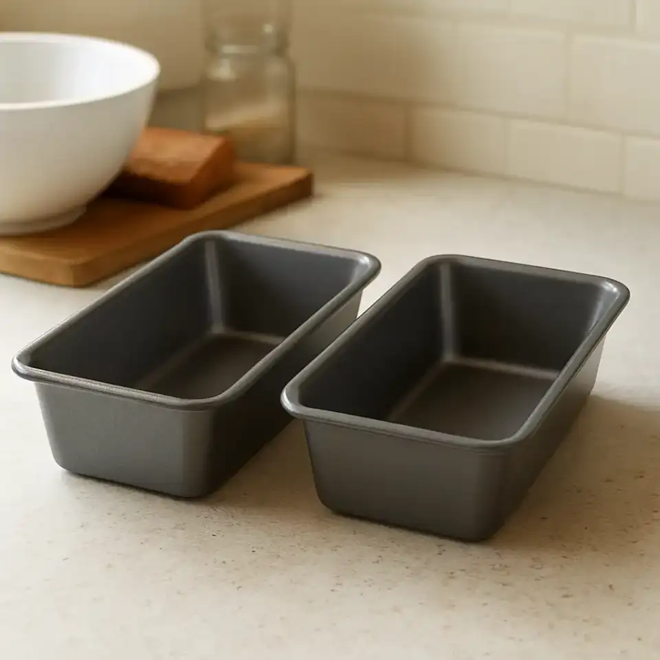 AI-generated editorial product photograph (not the exact linked listing) of loaf pan set